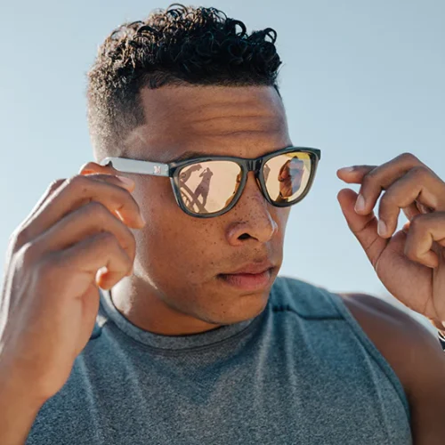 grey-sport-sunglasses-with-peach-lenses-knockaround